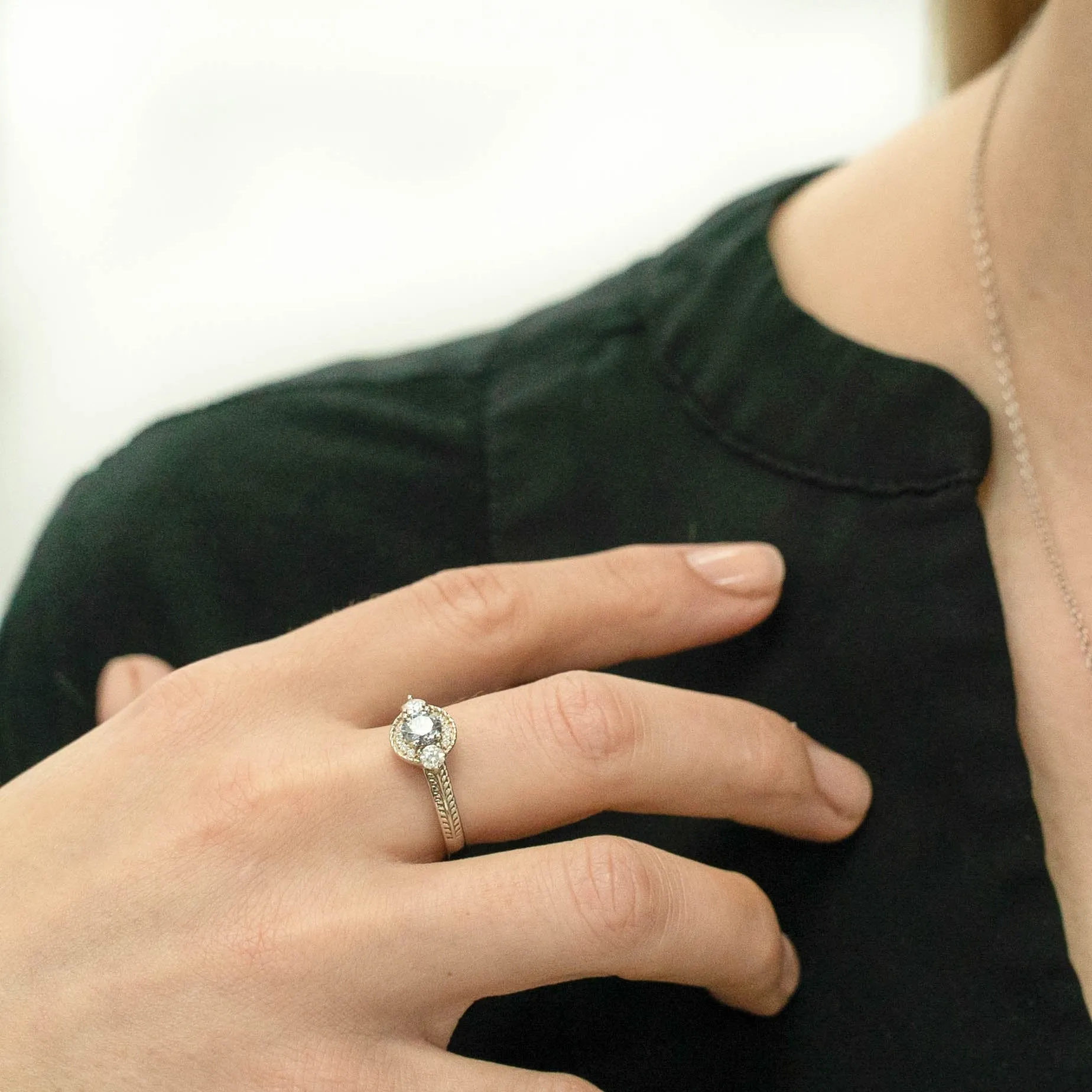 0.77 d.e.w cts Mili Moissanite Ring