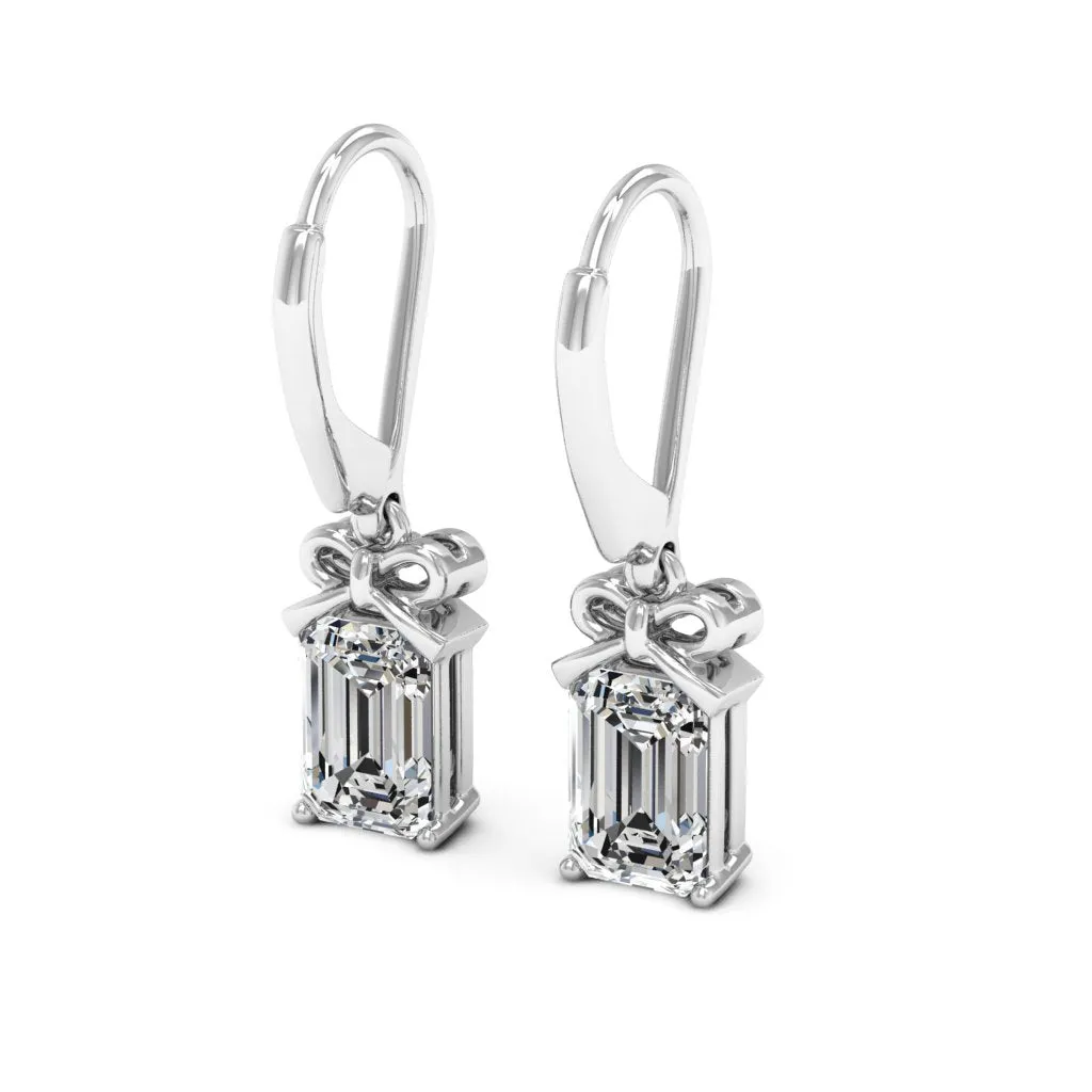 2.10 d.e.w cts 7x5mm Emerald Cut Naomi Moissanite Dangle Earrings
