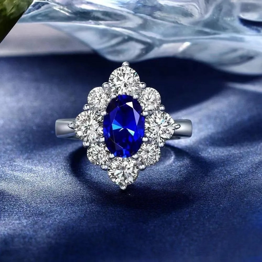 Anna Zuckerman Sterling Silver Oval Sapphire Blue Cubic Zirconia Halo Ring, Size 5 (97702)