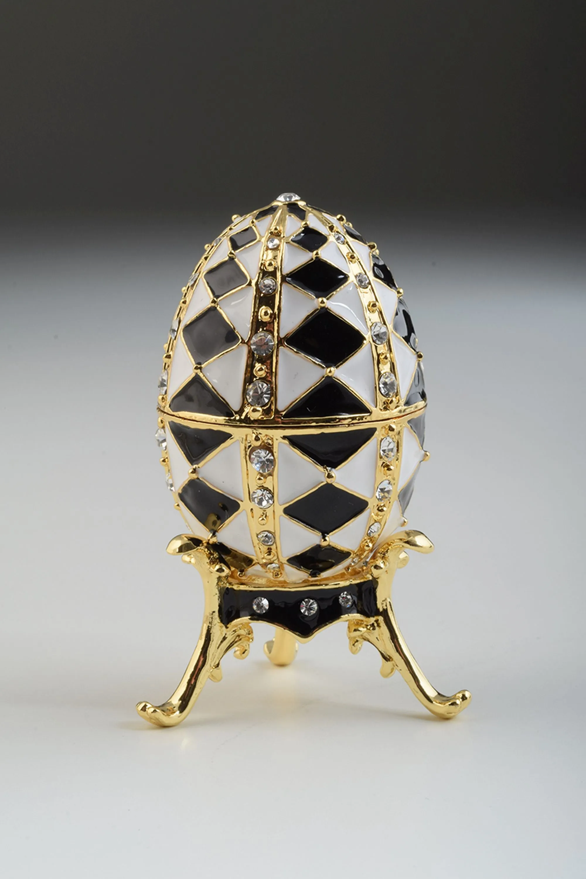 Black and White Faberge Egg with Gold Necklace Inside