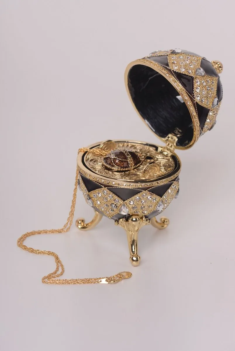 Brown Faberge Egg with Egg Pendant Inside