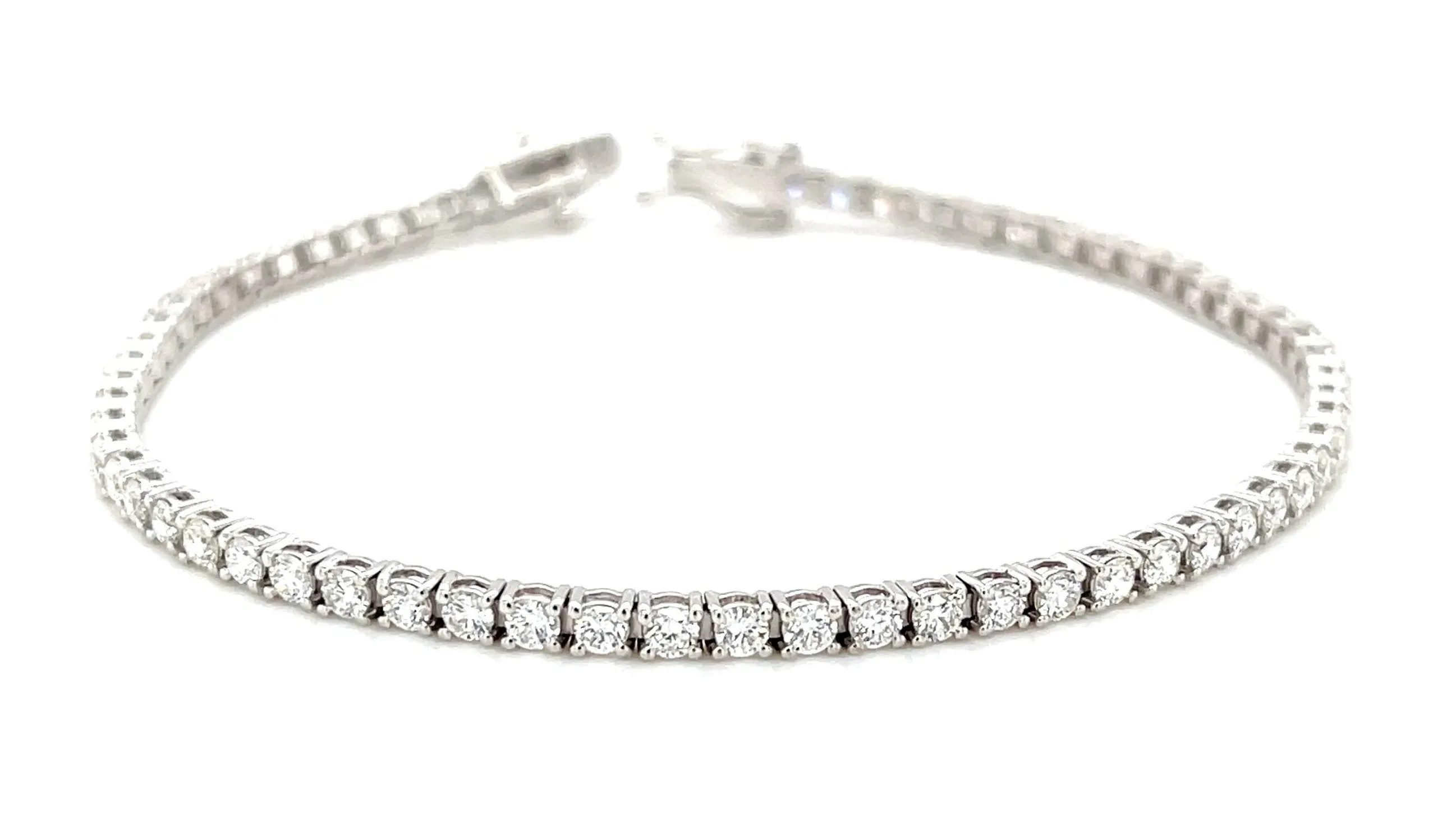 Diamond and 18k White Gold Tennis Bracelet, 2.94 Carats Total