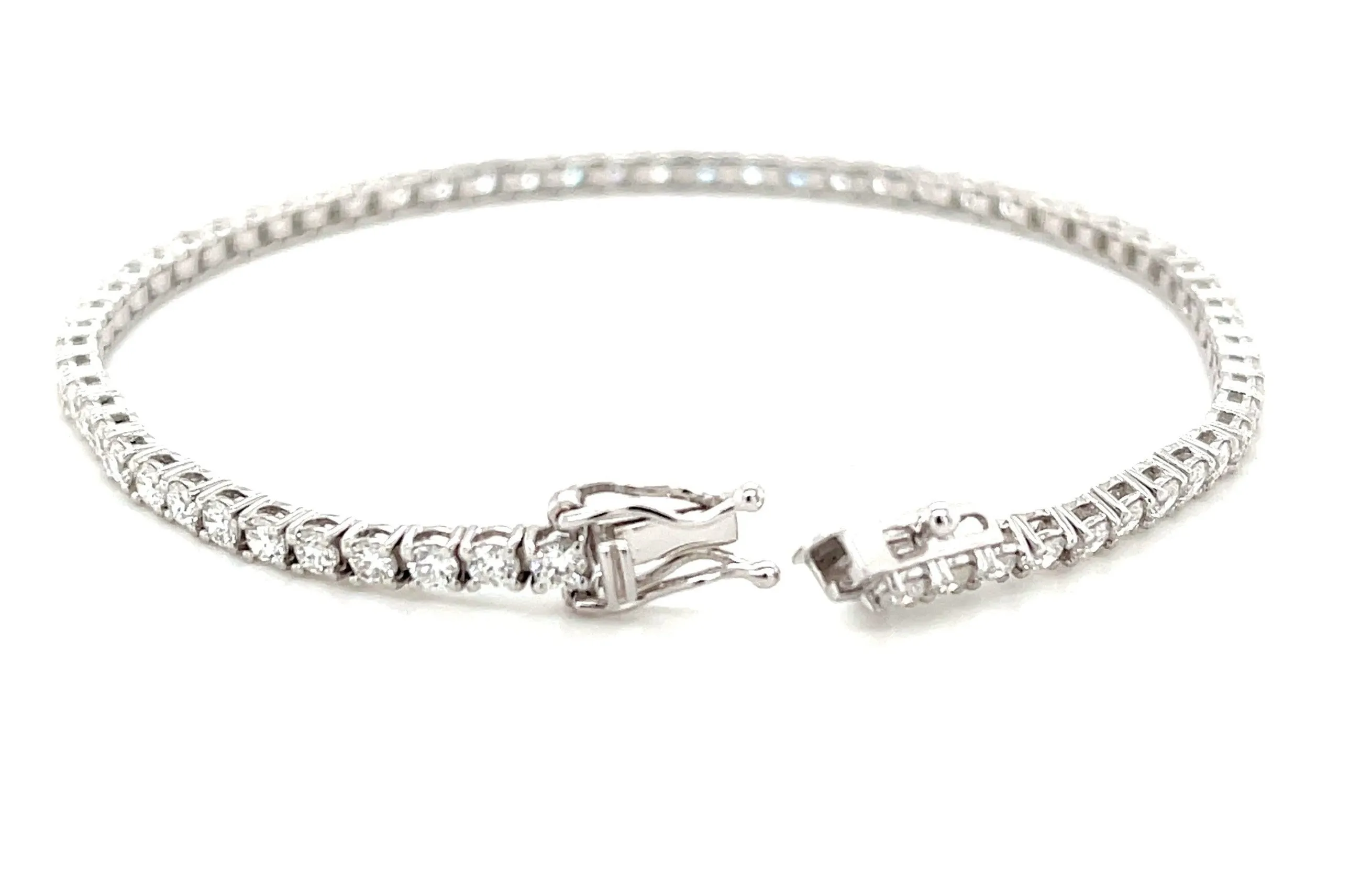 Diamond and 18k White Gold Tennis Bracelet, 2.94 Carats Total