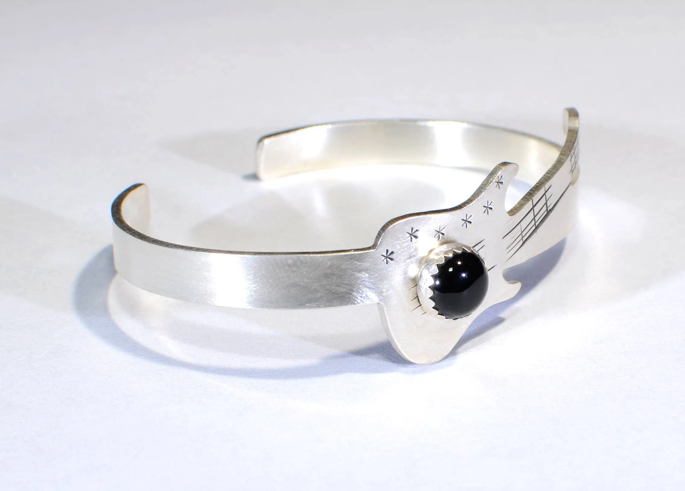 Sterling silver guitar bracelet with black onyx gemstone