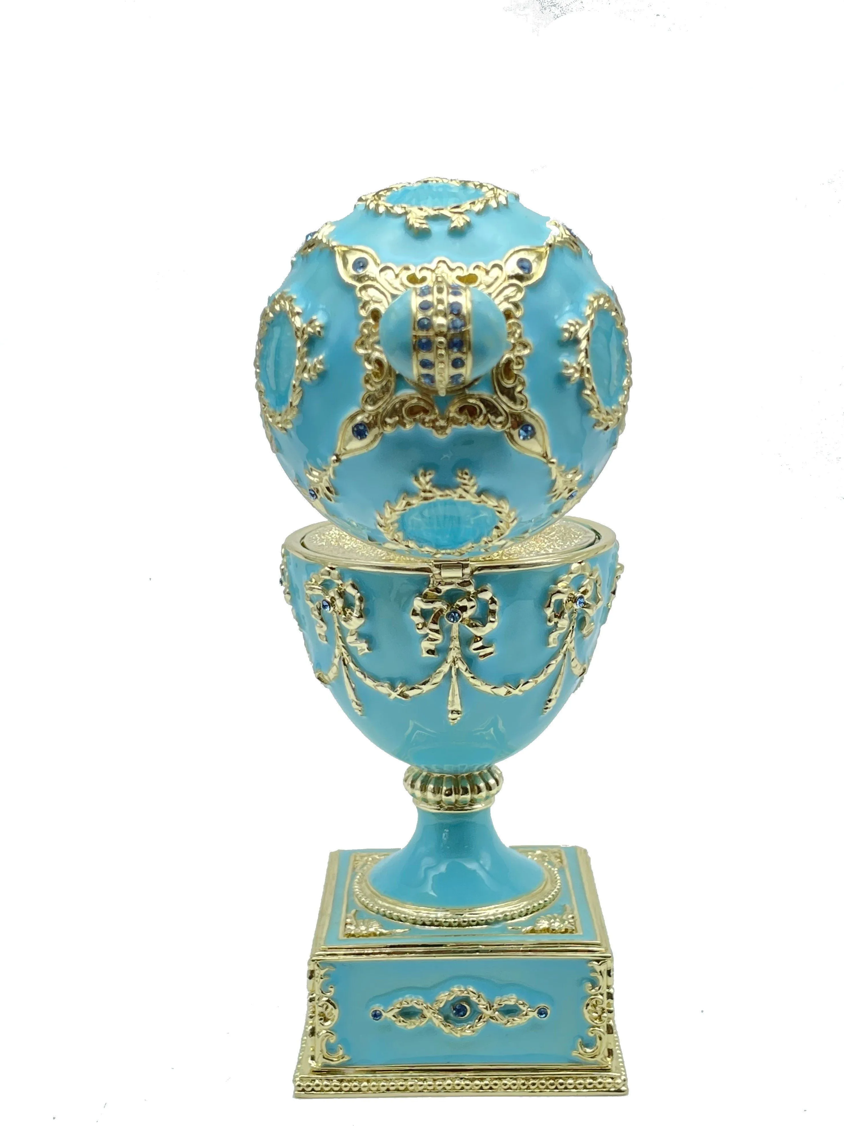 Turquoise Faberge Egg with Swan Inside
