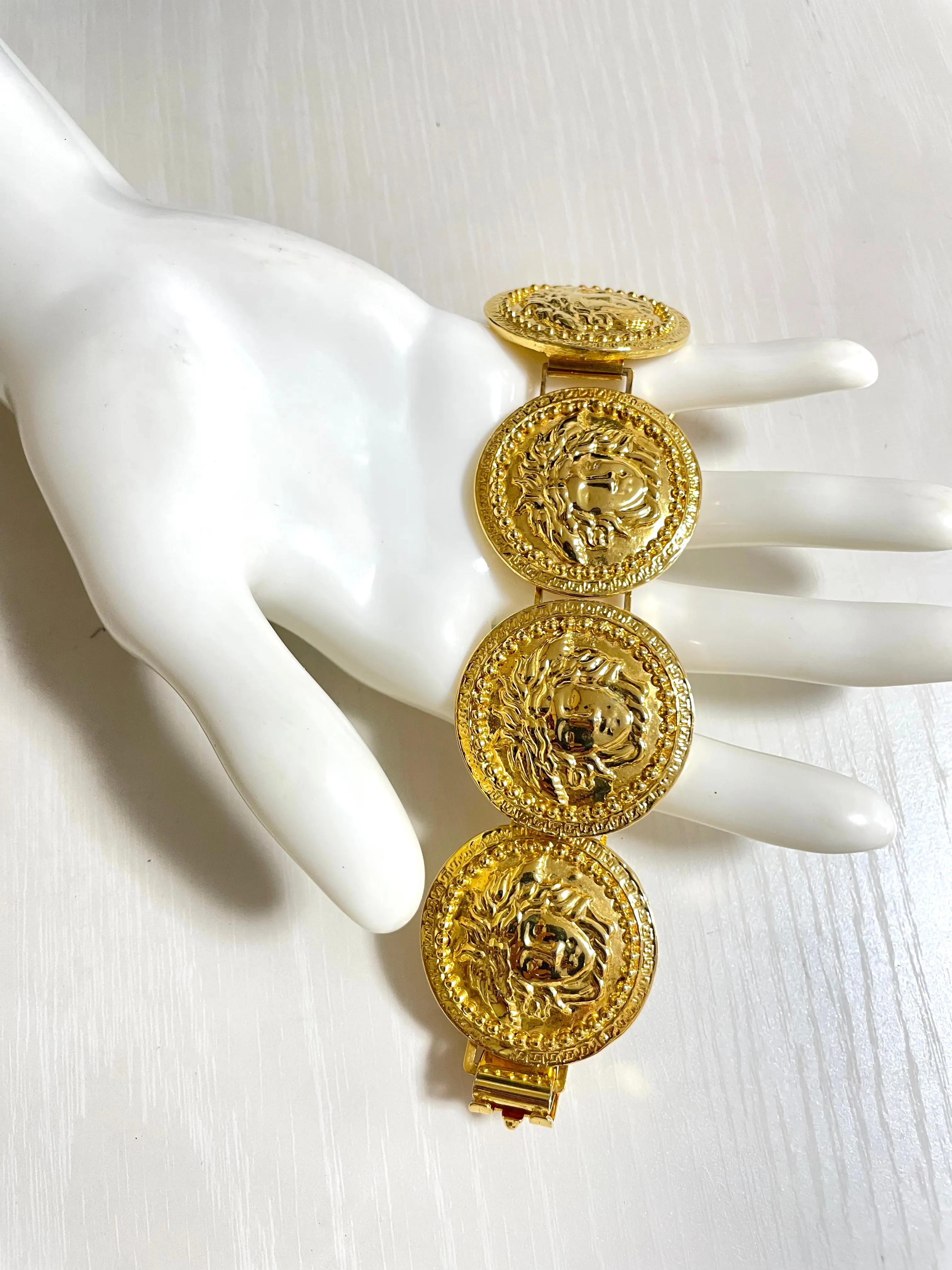 Vintage Gianni Versace gold tone medusa face motif bracelet. Must have Lady Gaga style jewelry piece. Great gift. 050525ra1