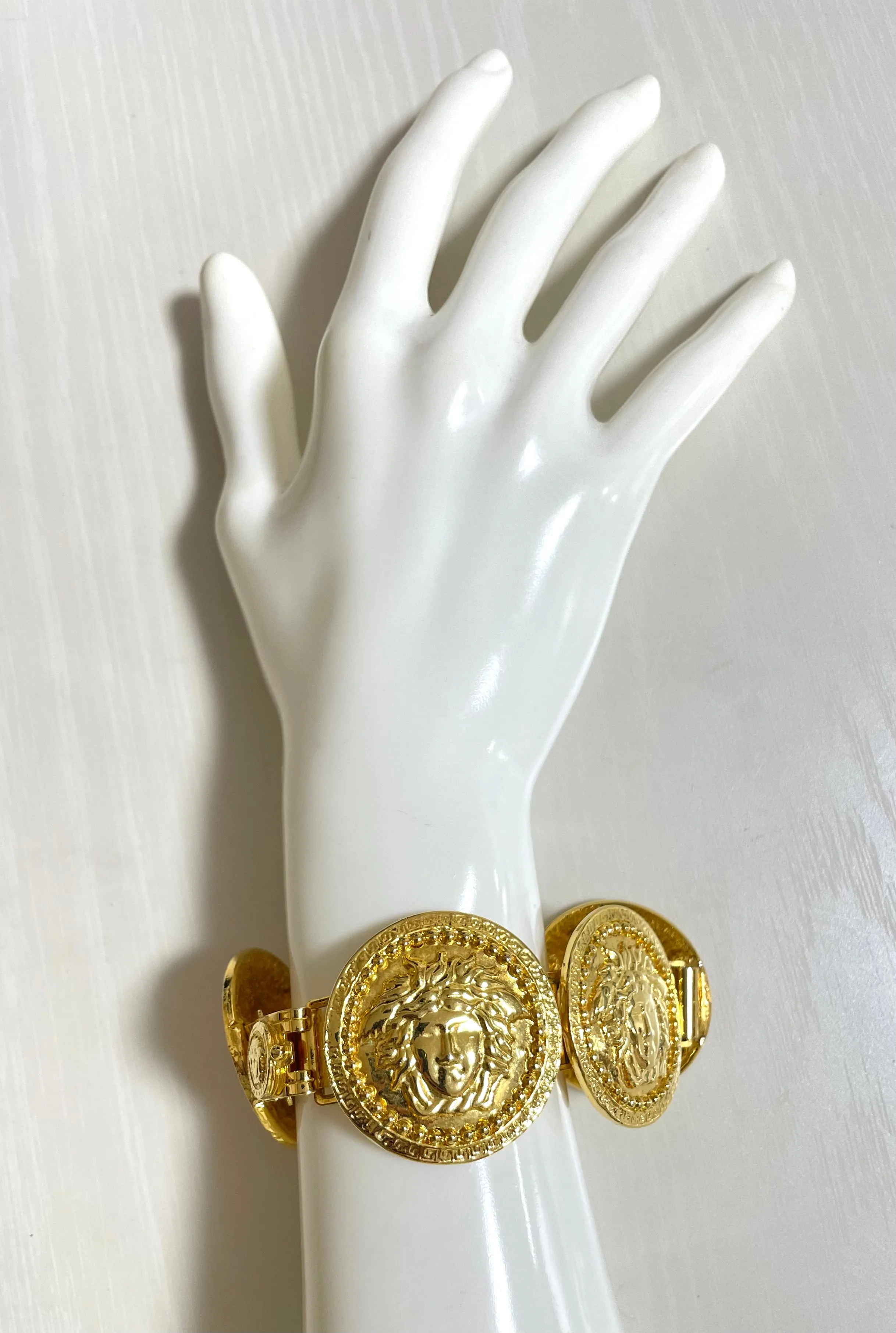 Vintage Gianni Versace gold tone medusa face motif bracelet. Must have Lady Gaga style jewelry piece. Great gift. 050525ra1