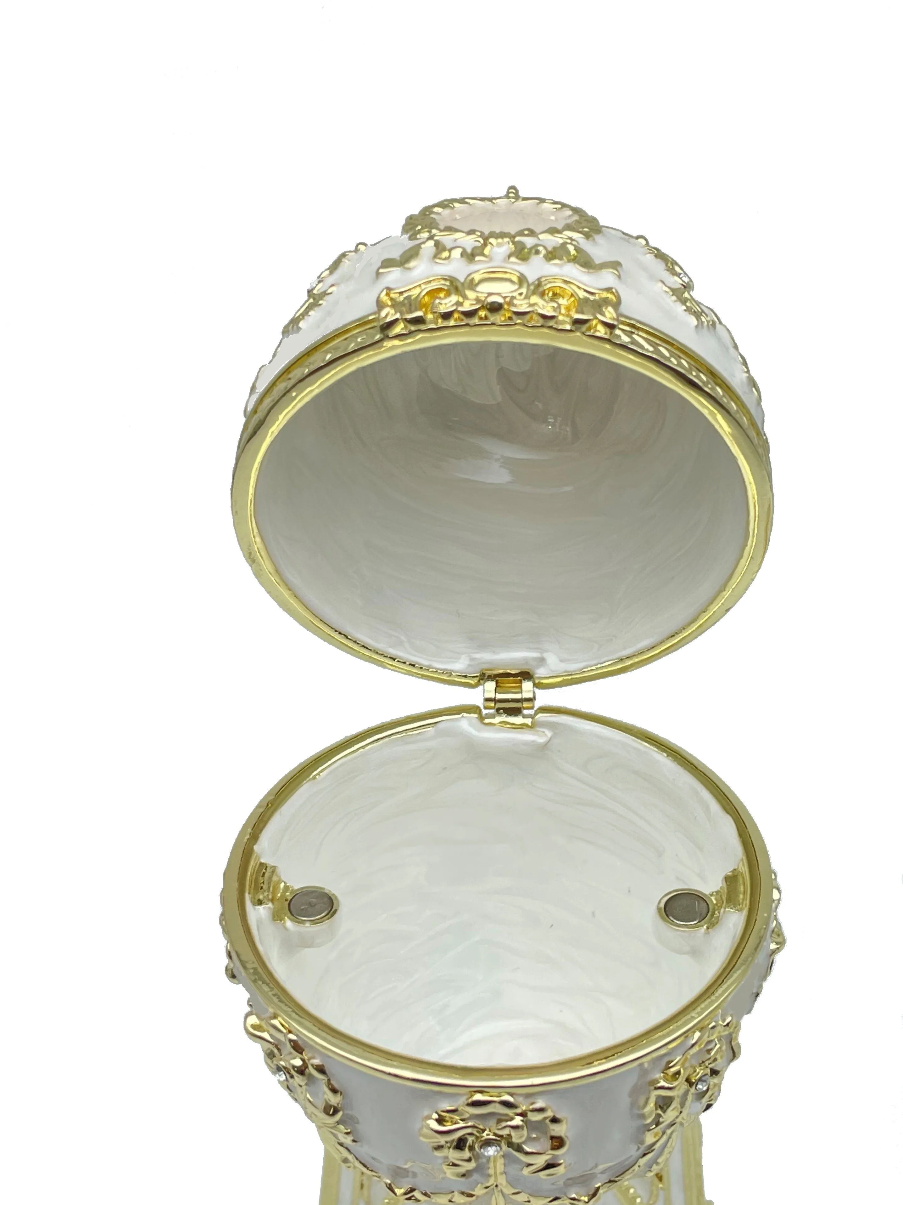 White Faberge Egg with Swan Inside
