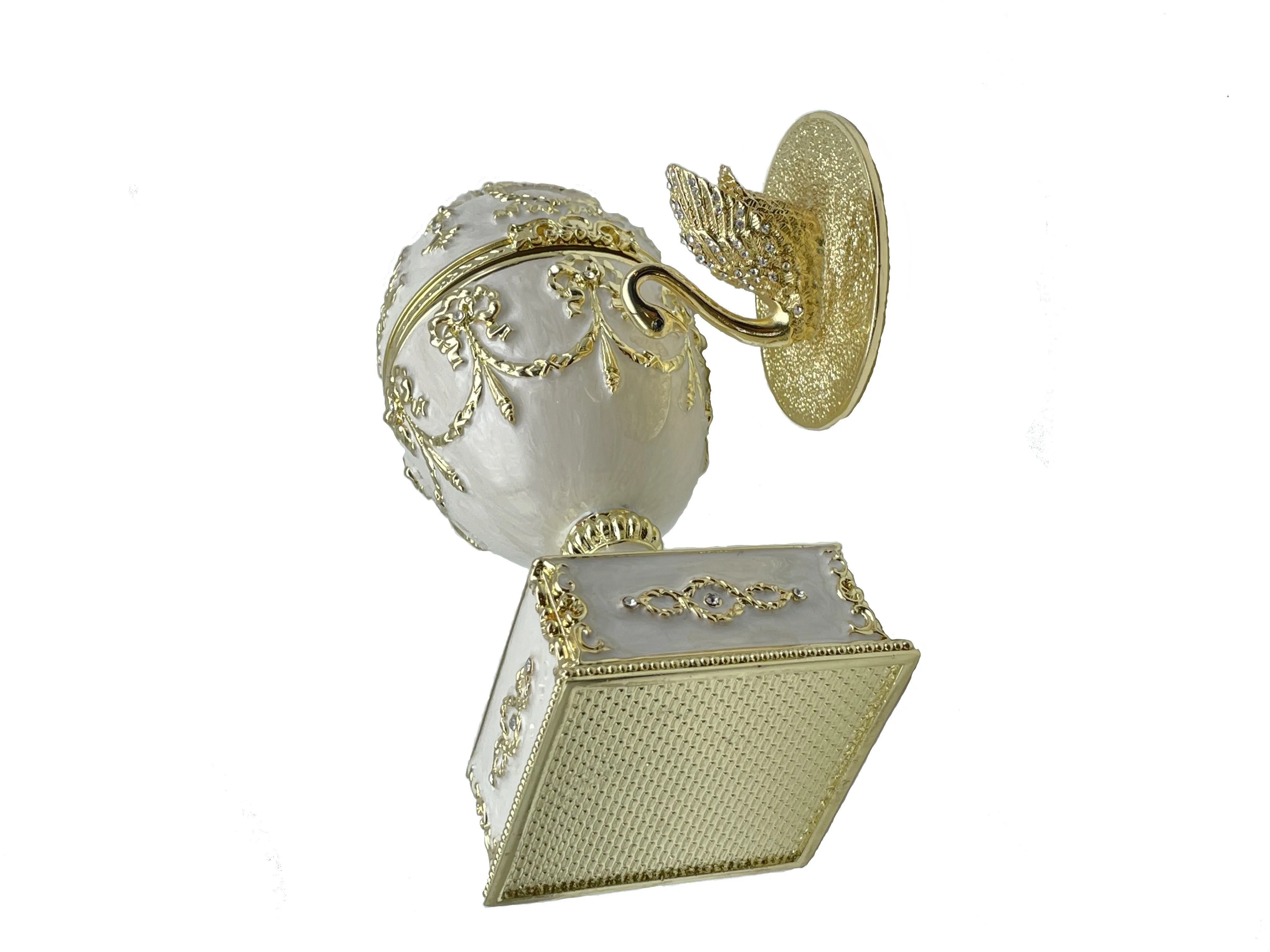 White Faberge Egg with Swan Inside